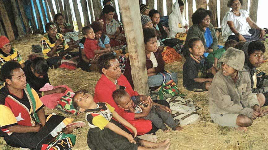 An image of a small congregation gathered in Mount Kare.